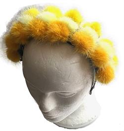 Hårbøjle i minkpels gule nuancer.