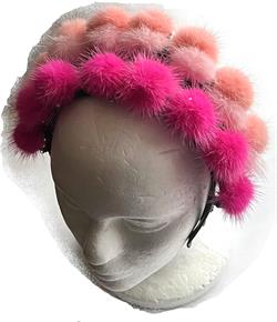 Hårbøjle i pels røde nuancer.